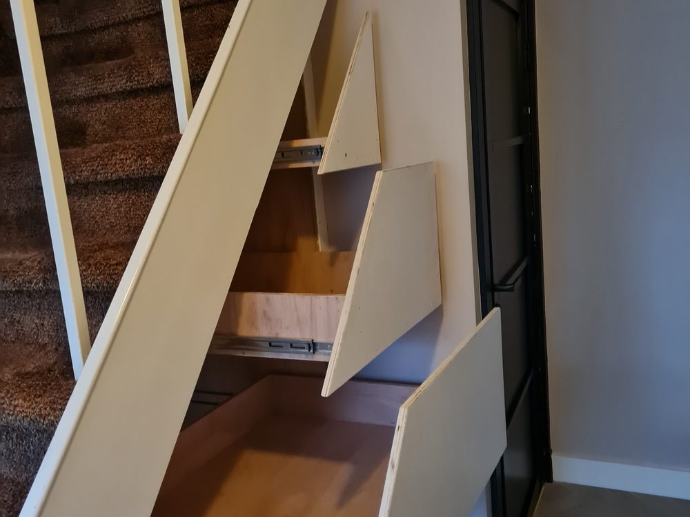 Maatwerk kast en lades onder de trap